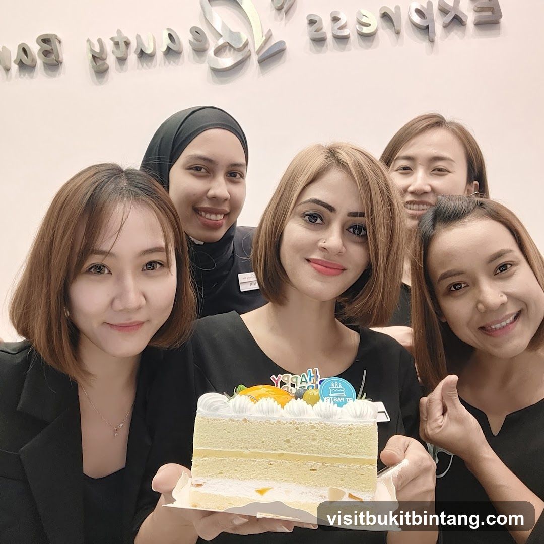 Team celebrating with a cake