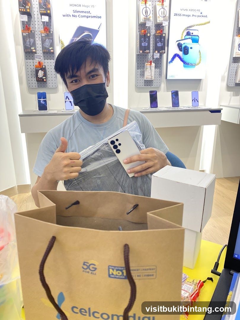 Man holding a new phone