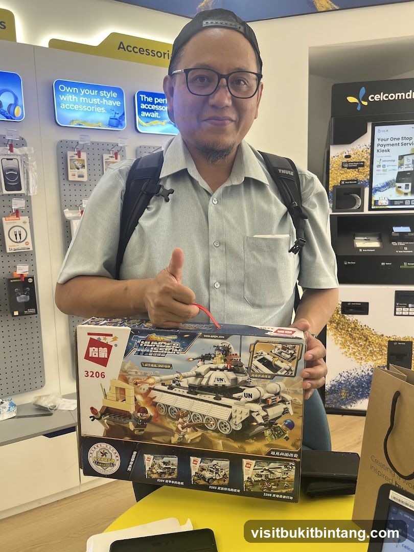 Man holding a toy tank set