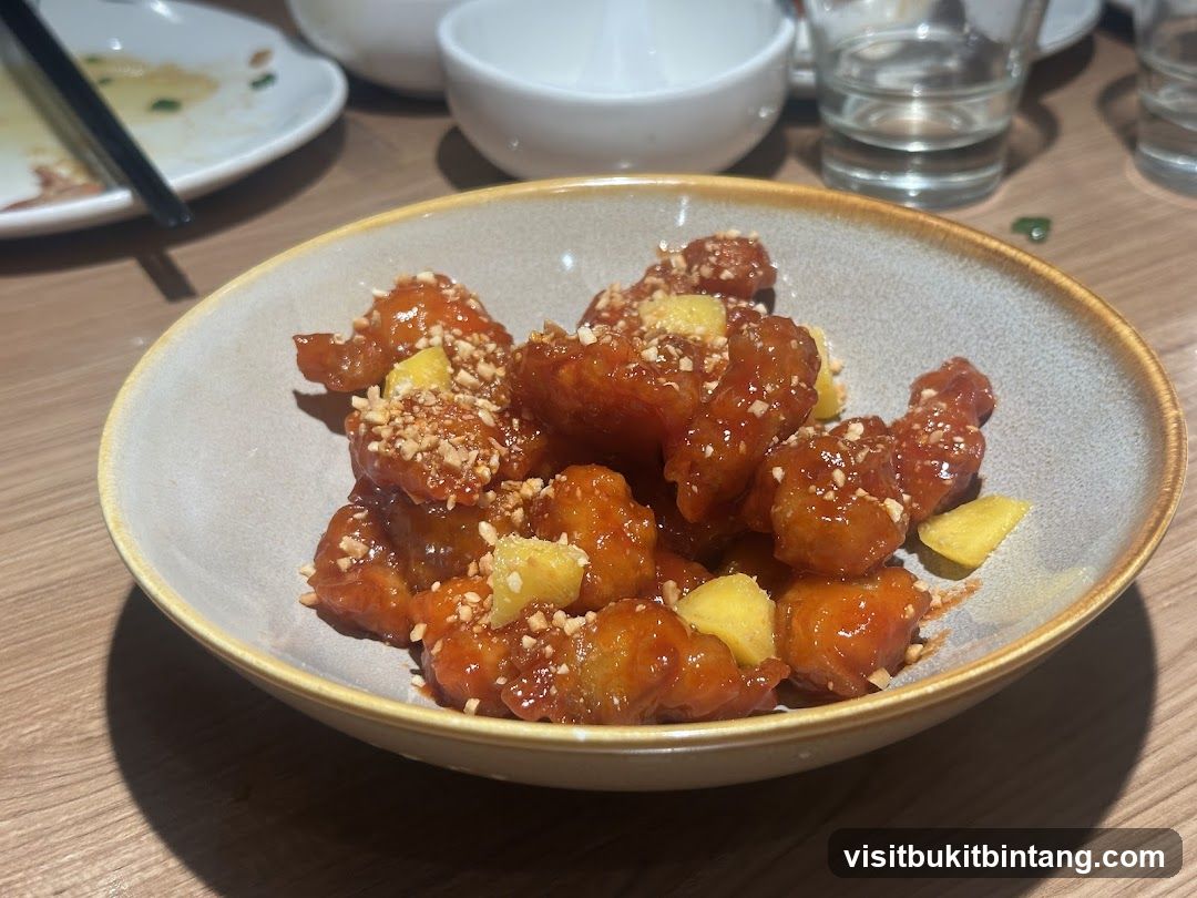 Sweet and Sour Chicken with Pineapple and Peanuts