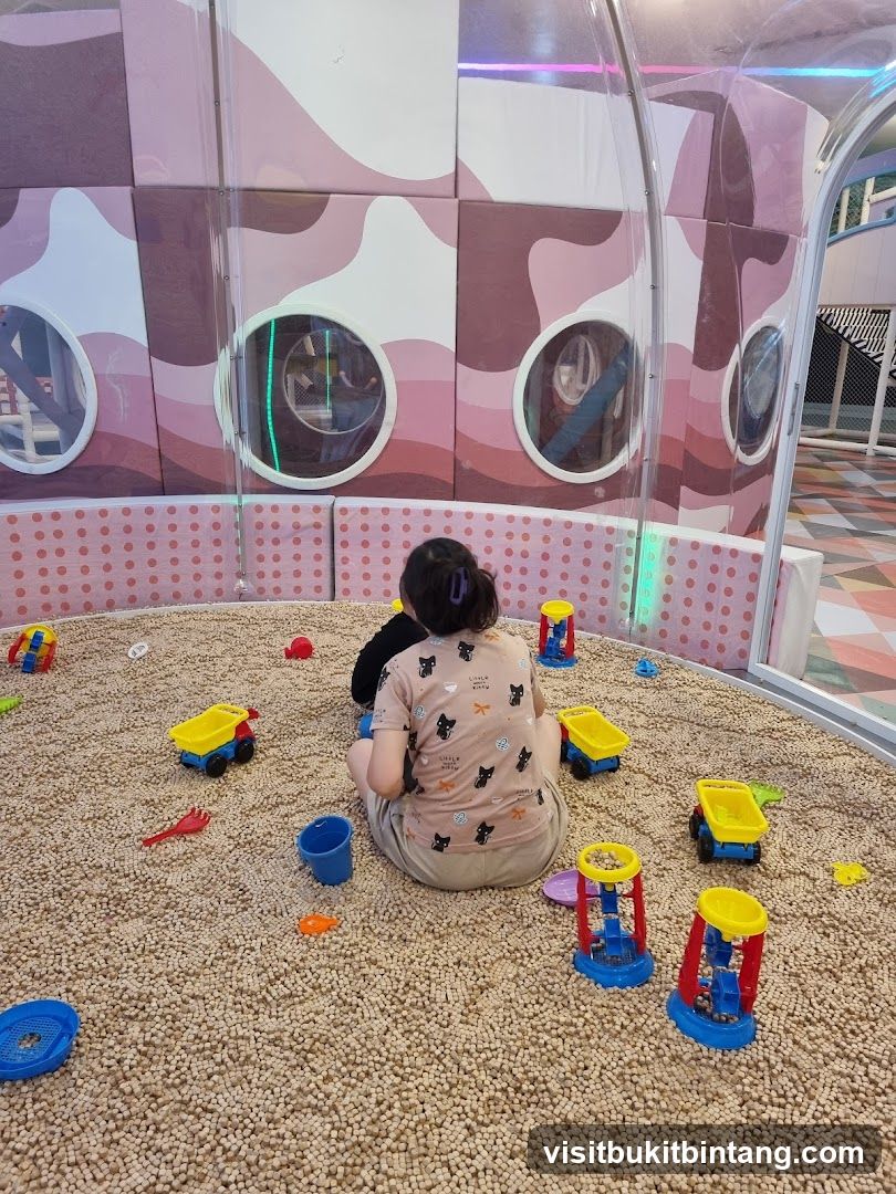 Children playing in a ball pit