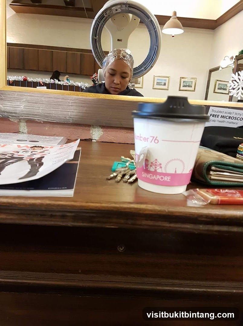 Woman under hair dryer
