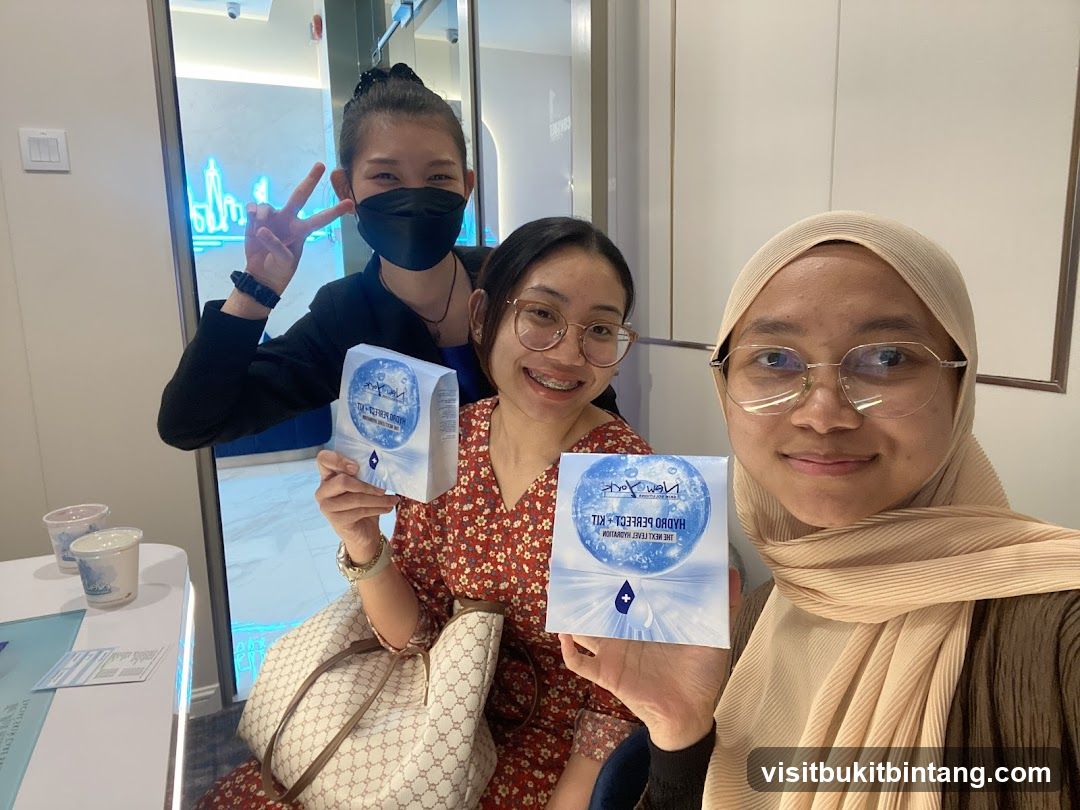 Three women holding product boxes