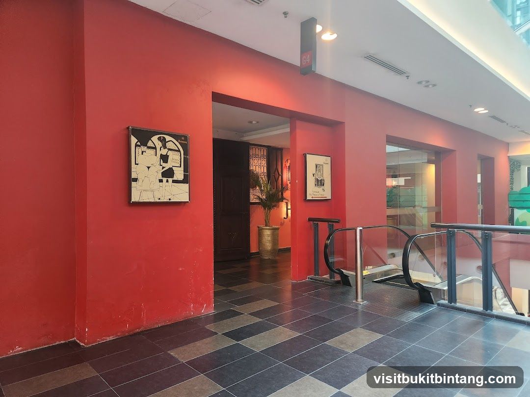 Interior hallway with artwork and escalators