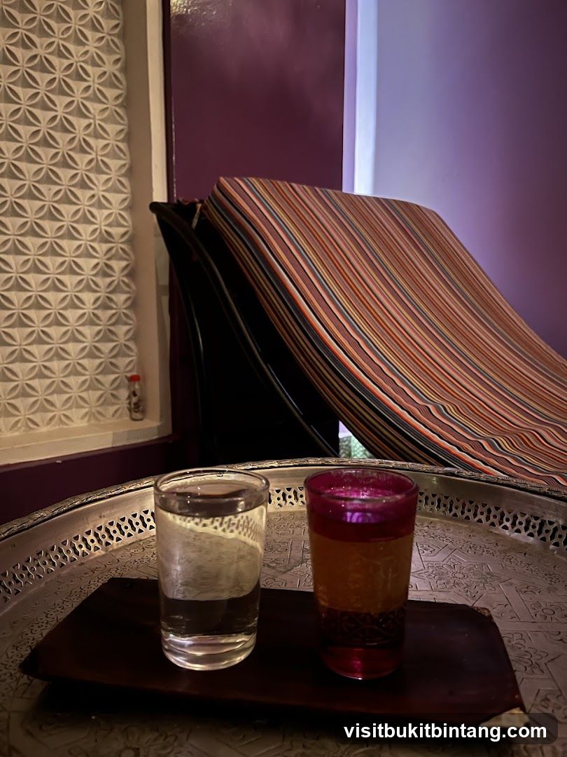 Two glasses of drink on a tray