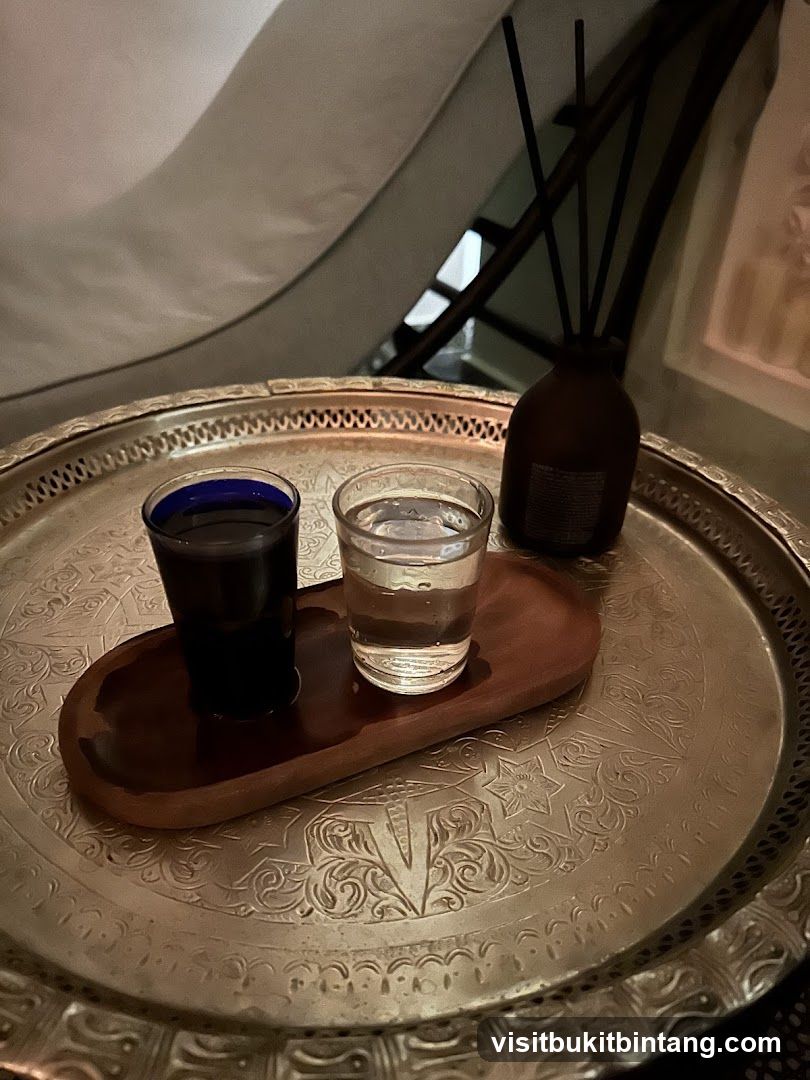 Two glasses of liquid on a tray