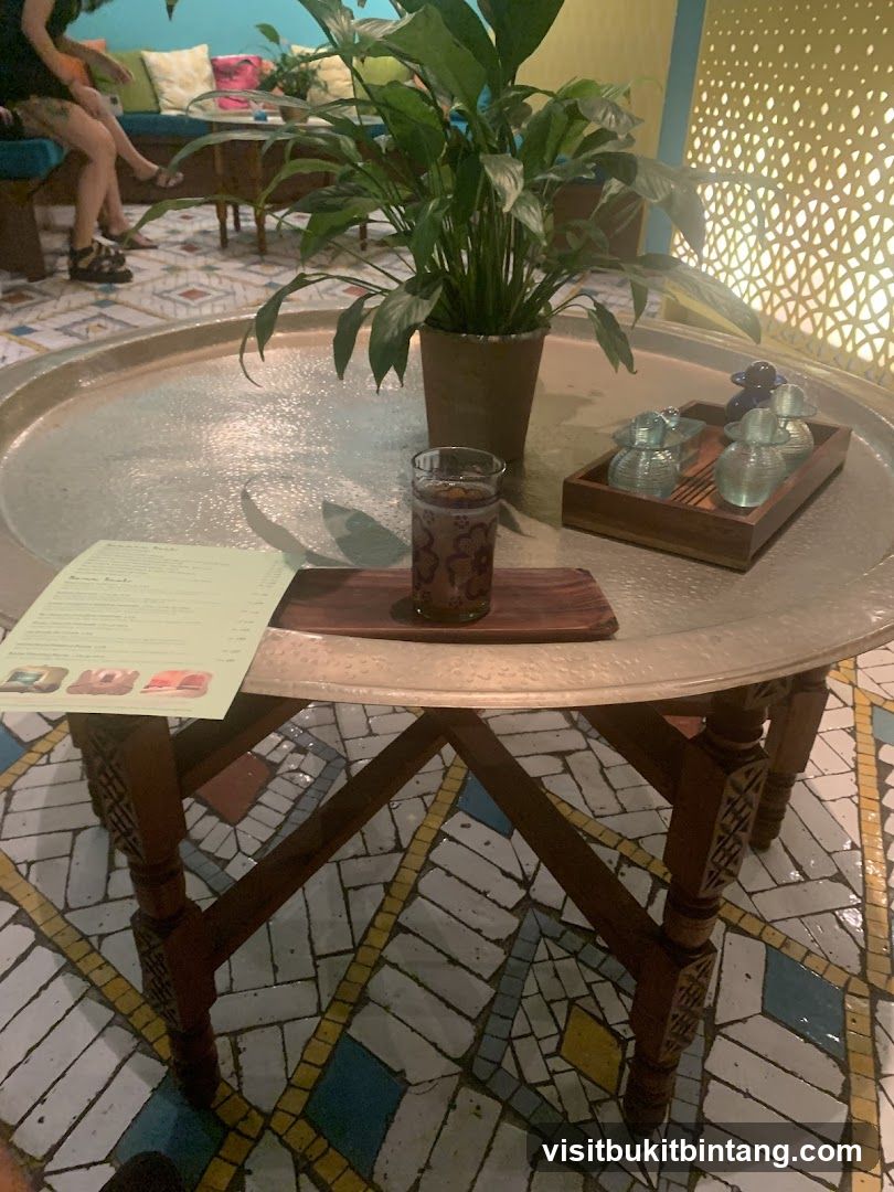 Table setting with a drink and small bottles