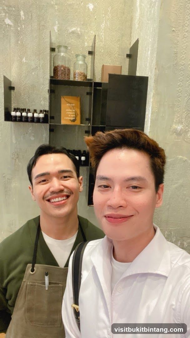 Two men smiling for a selfie