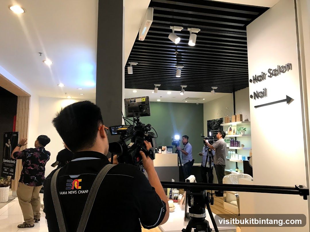 News crew filming inside a salon