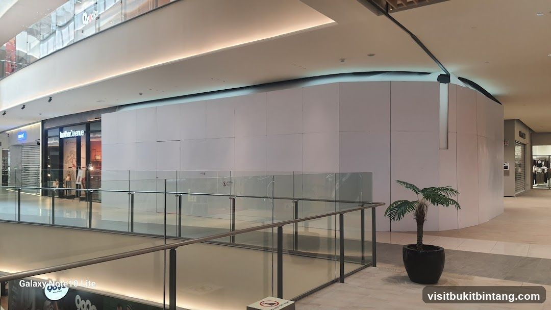 Mall Interior with Storefront and Construction Barrier