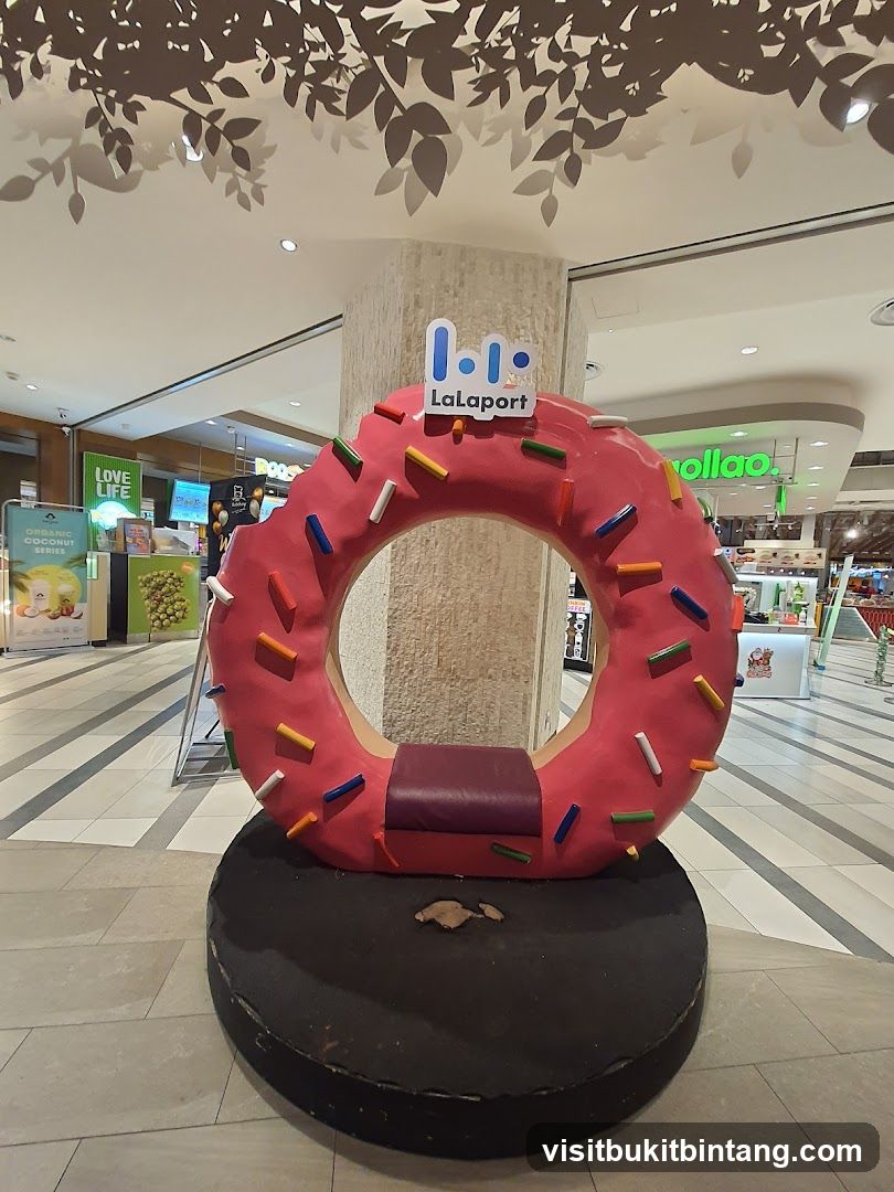 Donut-shaped photo booth with LaLaport logo