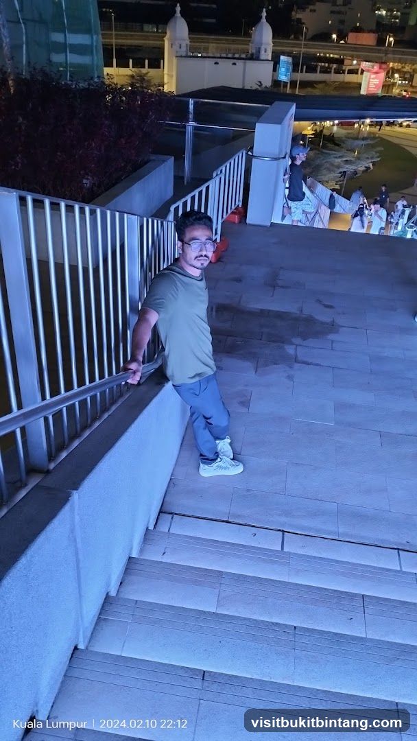 Man on stairs at night