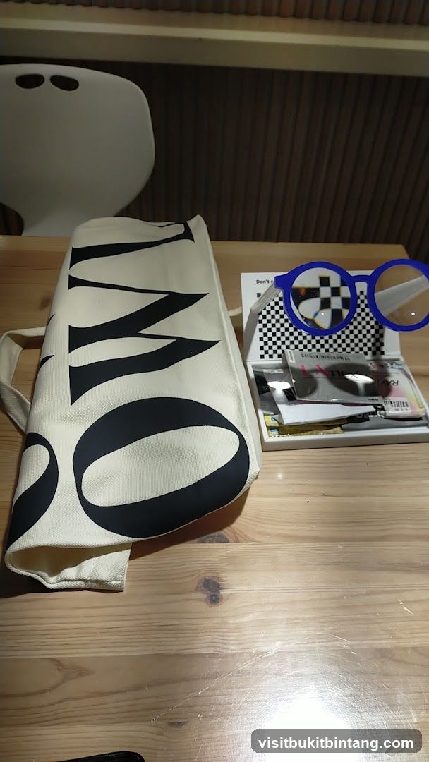 Tote bag and display of sunglasses