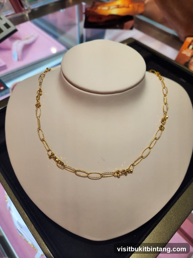 Gold necklace on display