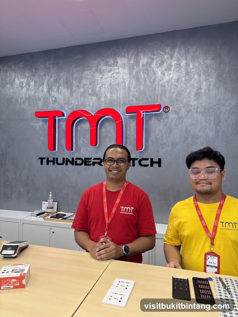 Two Employees Standing Behind a Counter