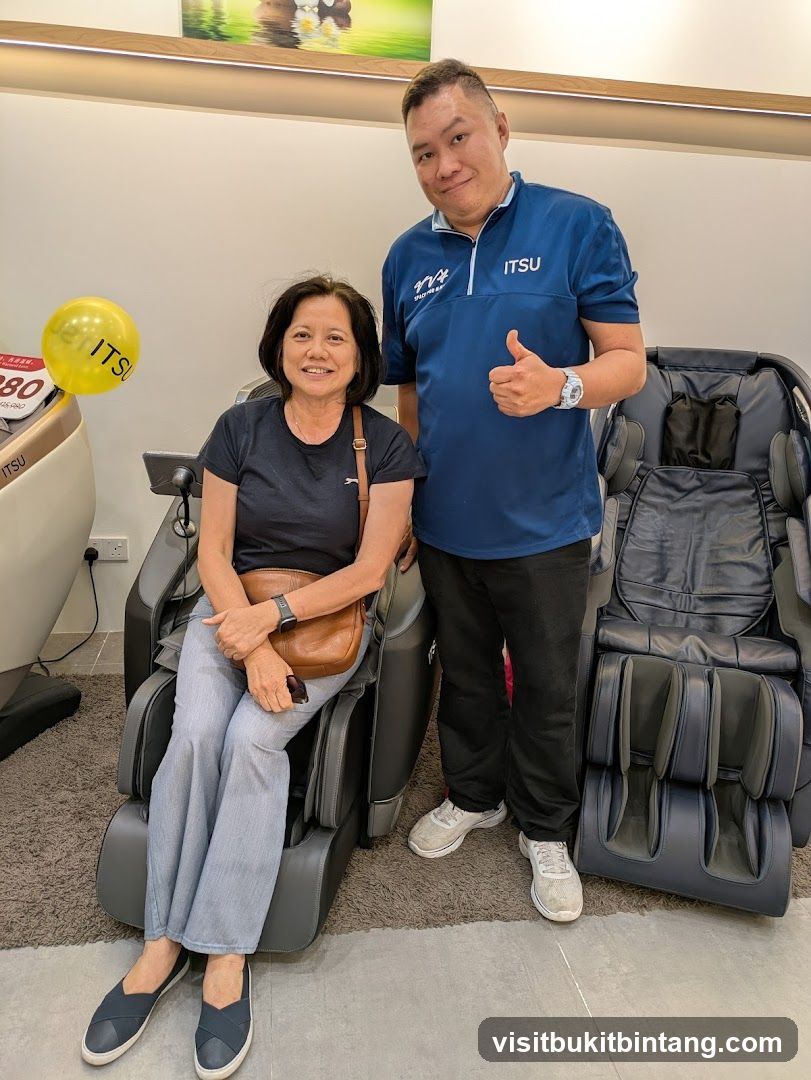 People posing with massage chairs