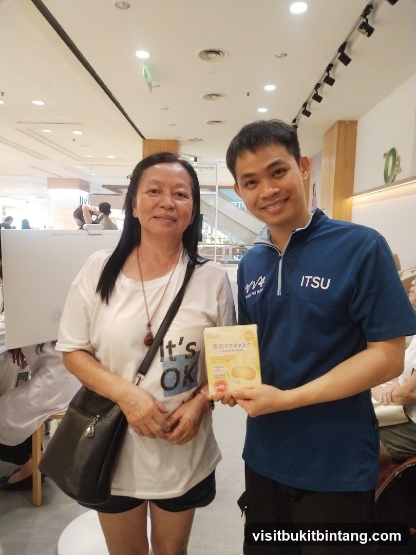 Two people holding a product