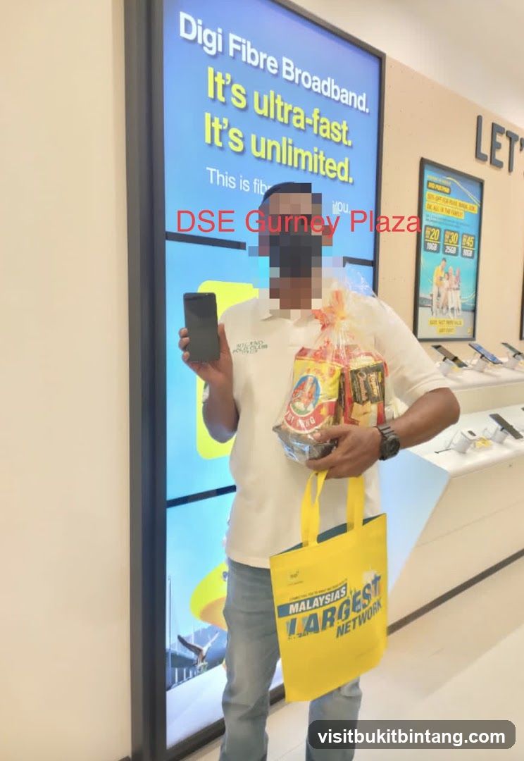 Man holding a phone and a gift basket