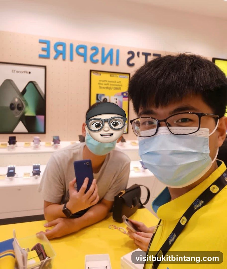Two people in a phone store