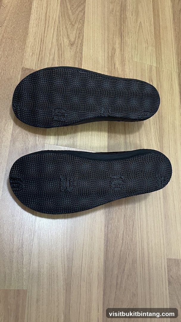 Soles of black flip-flops