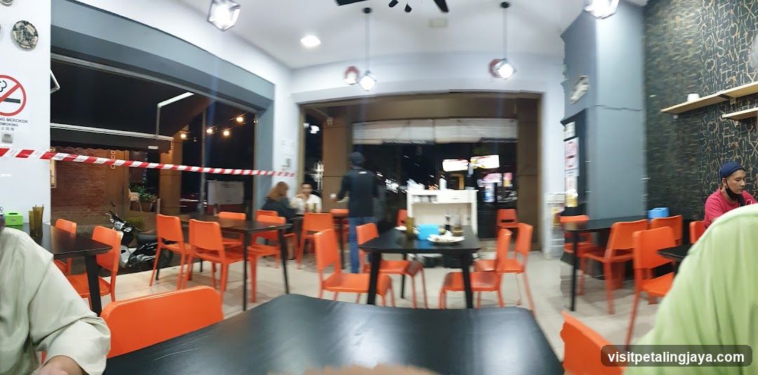 Restaurant Interior with Orange Chairs