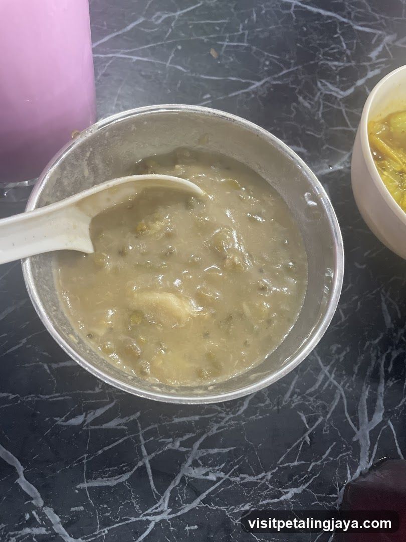 Bowl of Gravy with Spoon