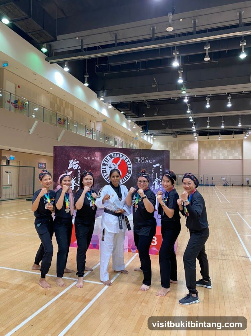 Taekwondo Team Posing with Medals