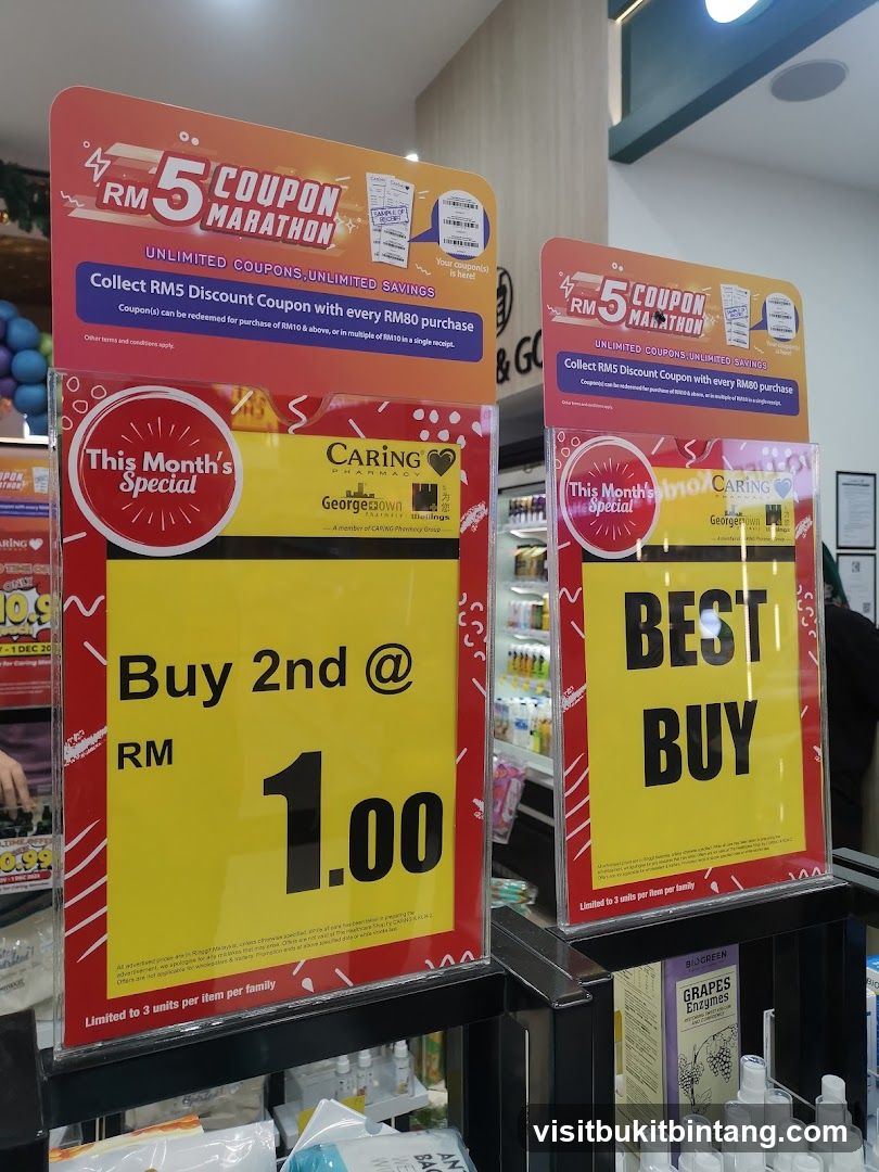 Promotional signs for CARING Pharmacy