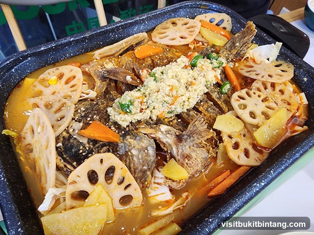 Spicy Braised Fish with Lotus Root and Carrots