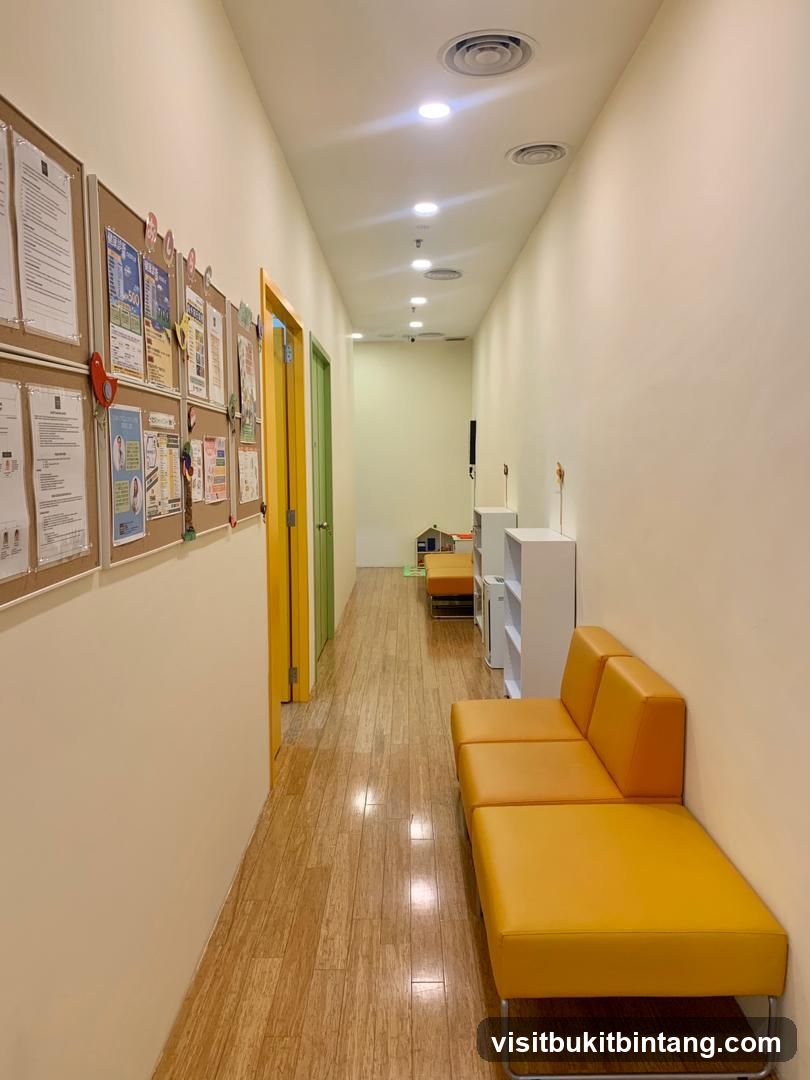 Hallway with seating and bulletin boards