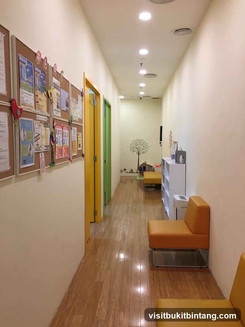 Hallway with bulletin boards and seating