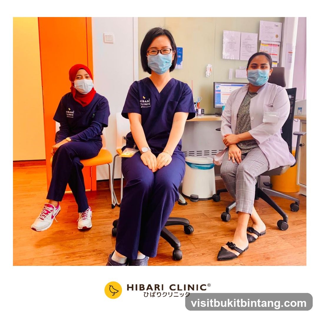 Three medical professionals in a clinic