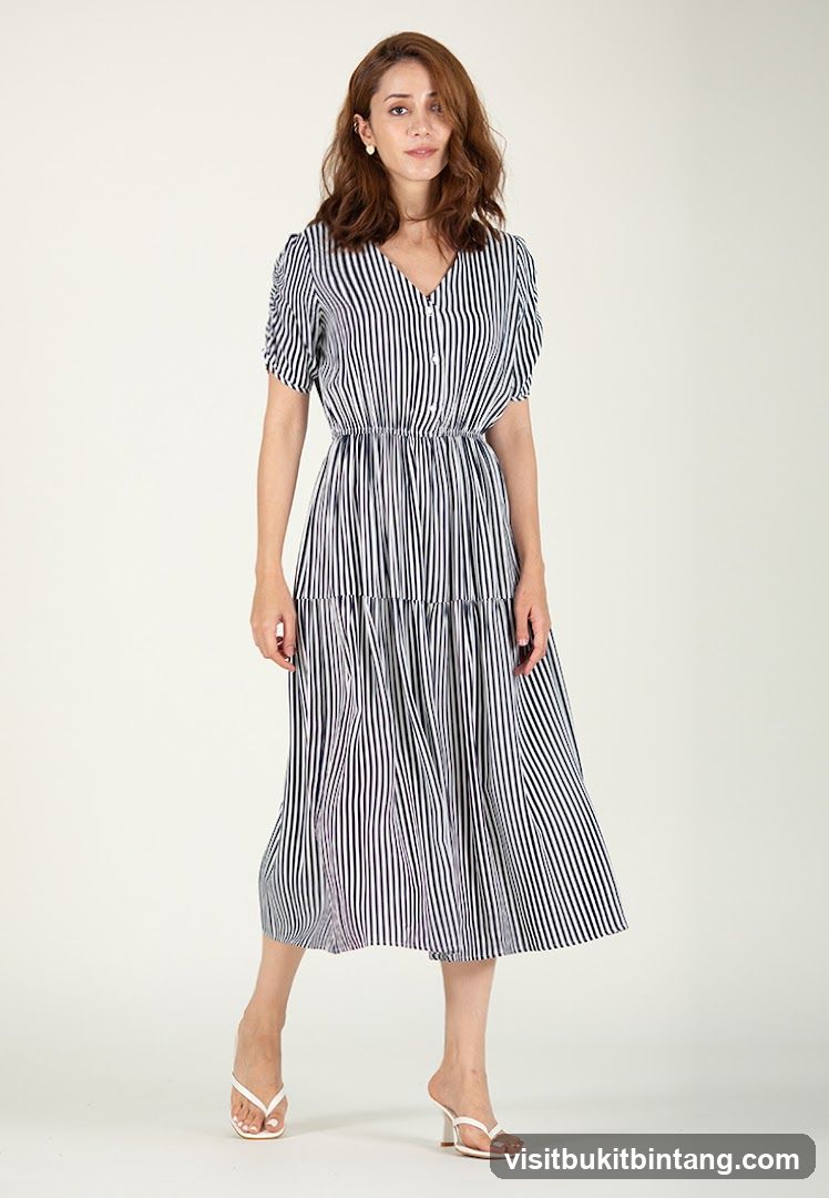Woman in Striped Dress
