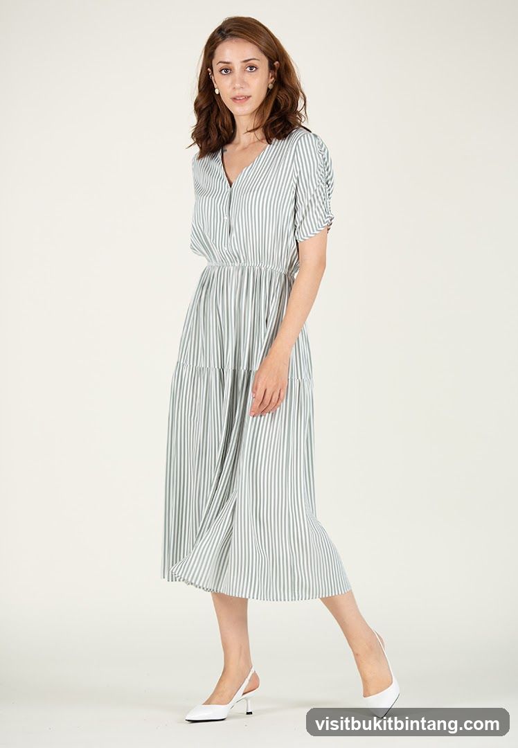 Woman in Striped Dress