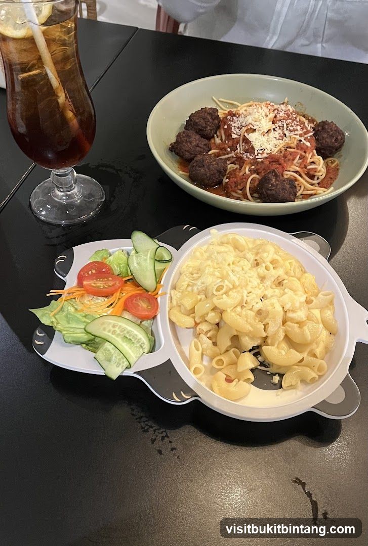 Meal with Spaghetti and Meatballs, Macaroni and Cheese, and Salad