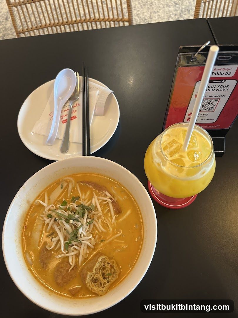 Laksa and Orange Juice