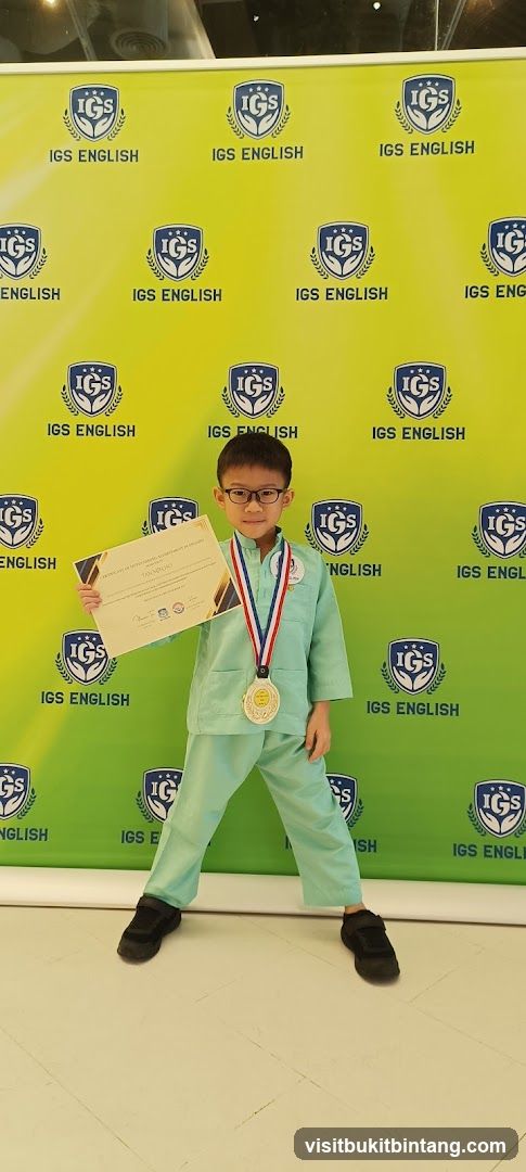 Boy with Certificate and Medal