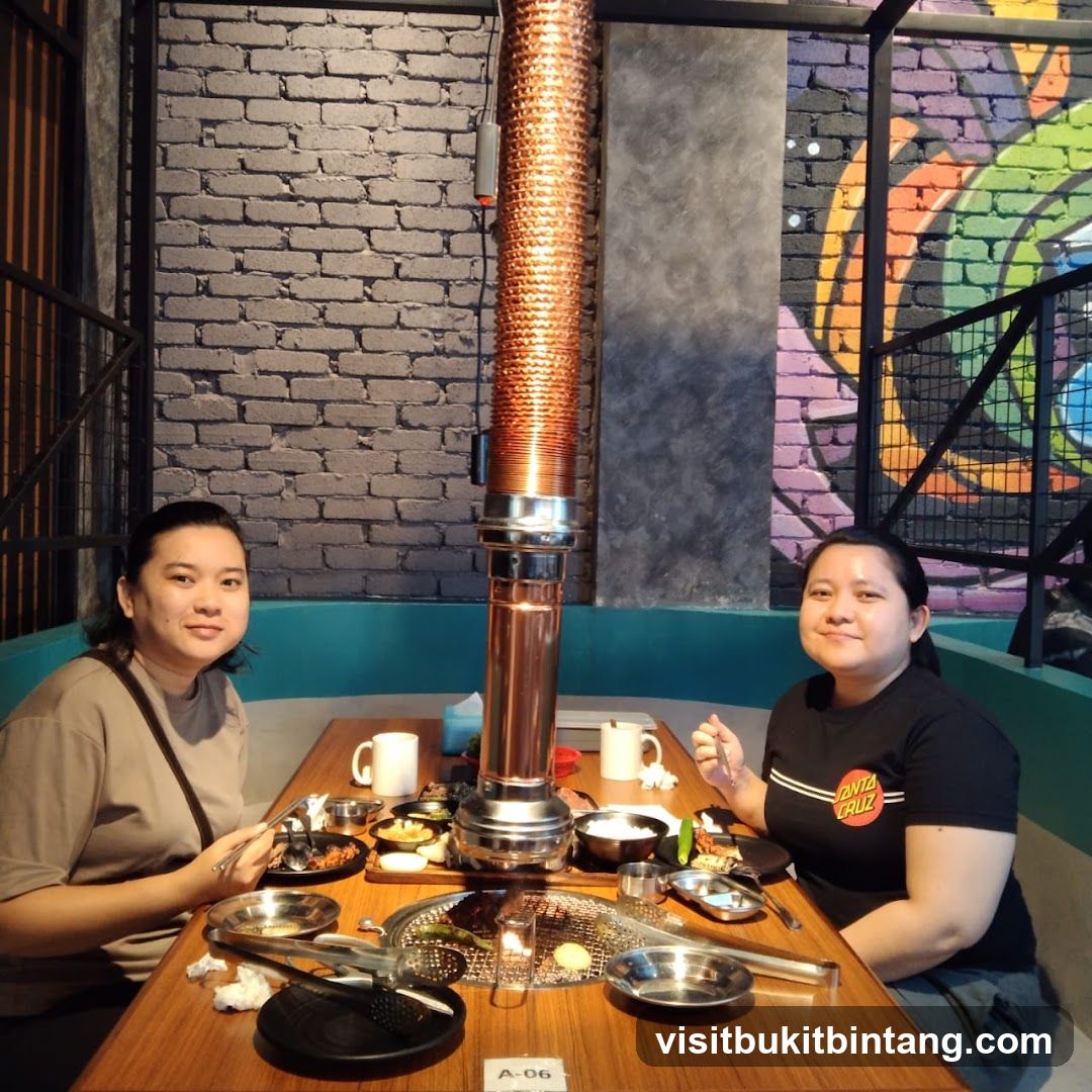 Two Women at a Korean BBQ Restaurant