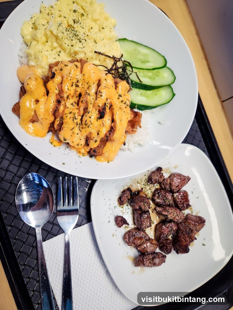 Two plates of food with cutlery