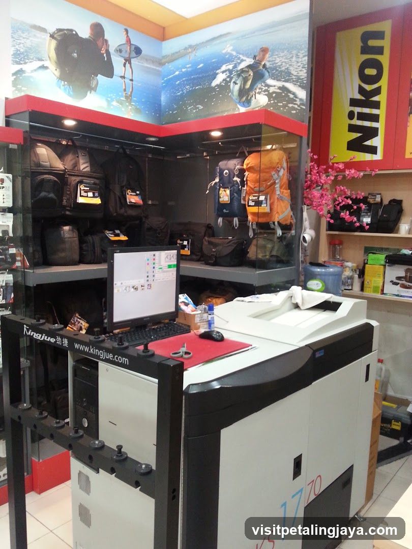 Camera Shop Interior with Printing Equipment