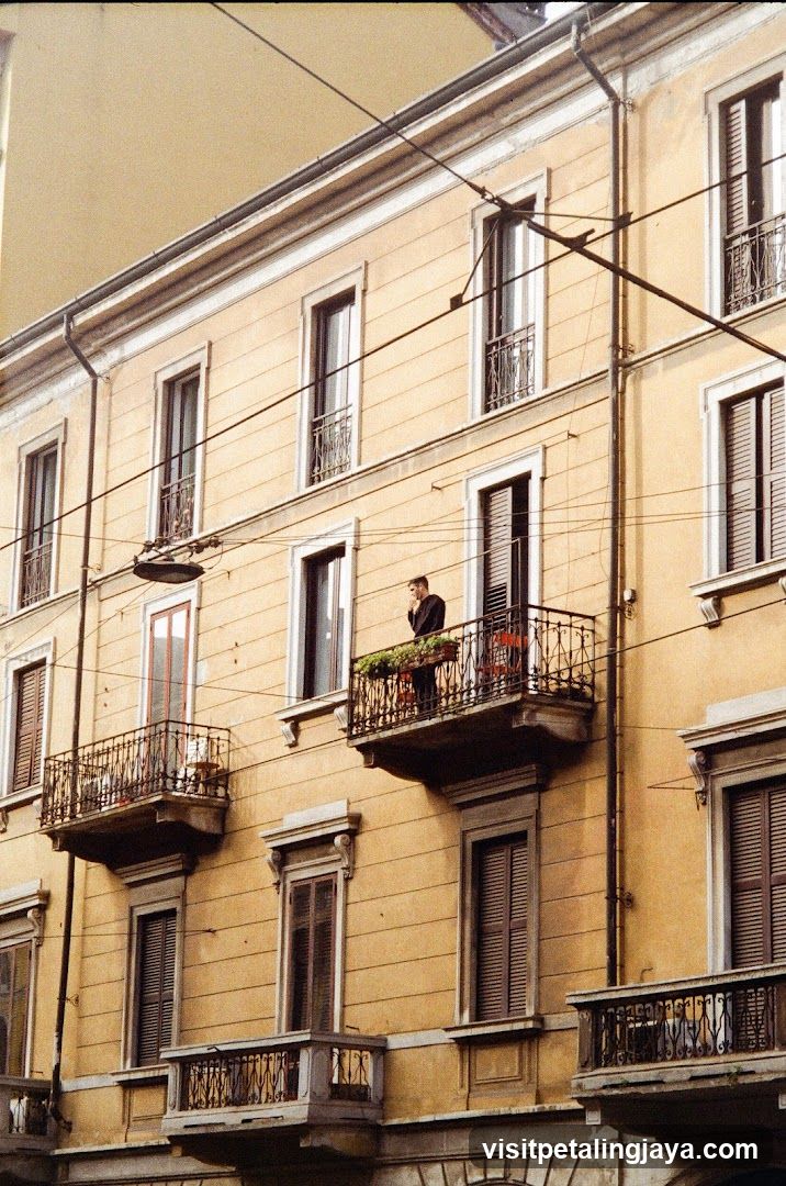Man on Balcony