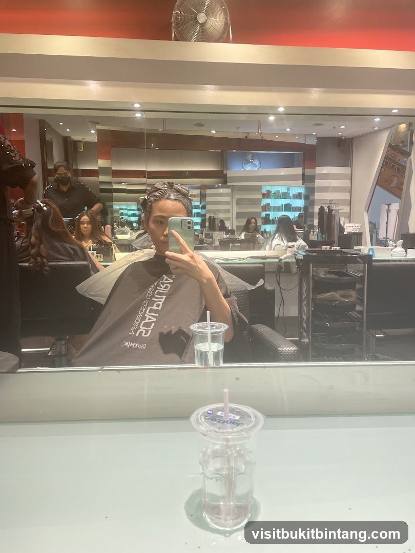 Woman getting hair treatment