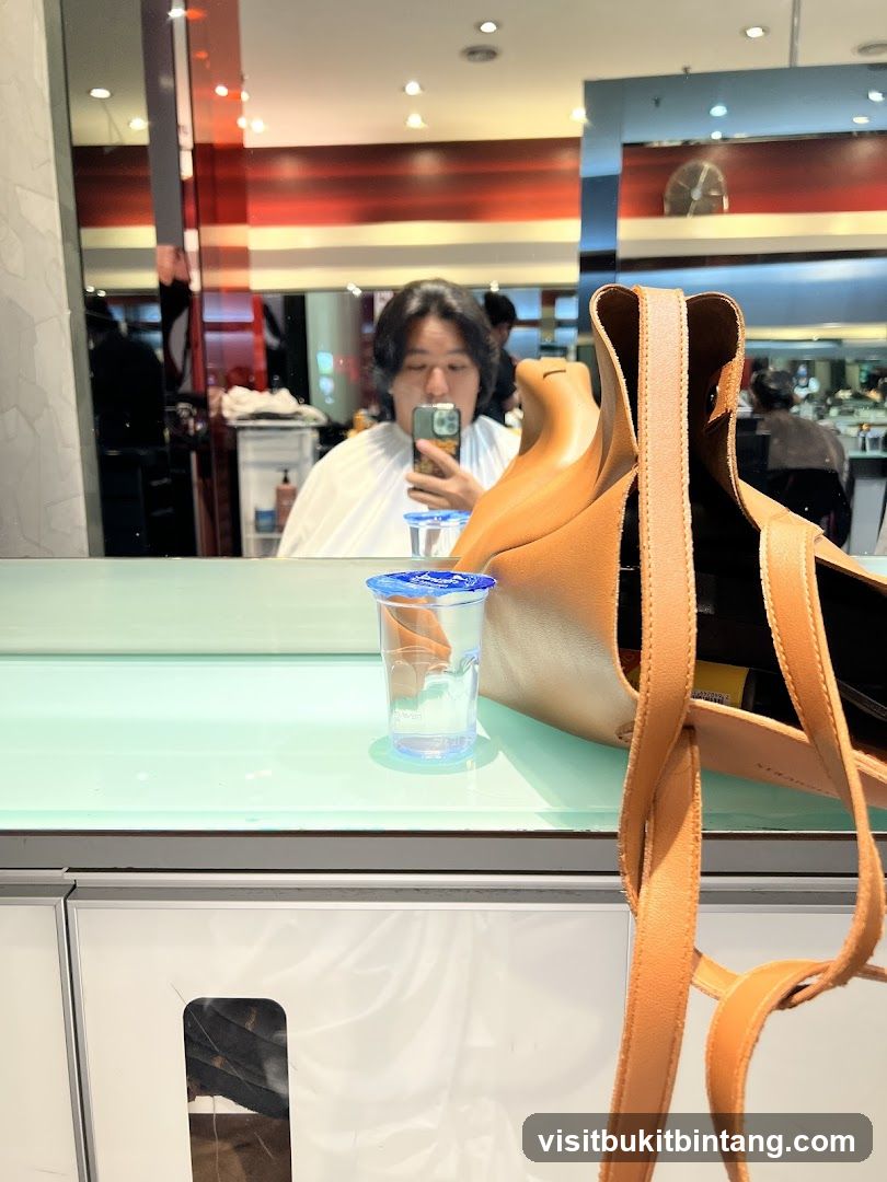 Person taking a selfie in a salon