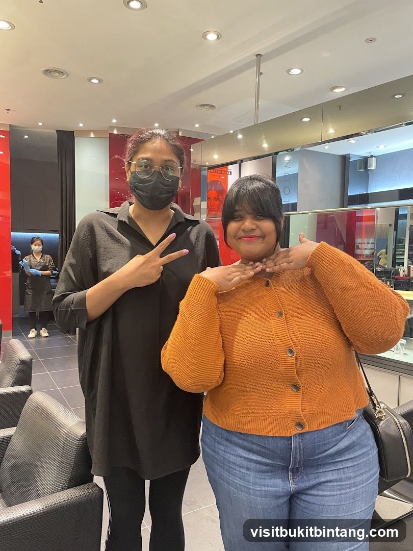 Two women posing in a salon
