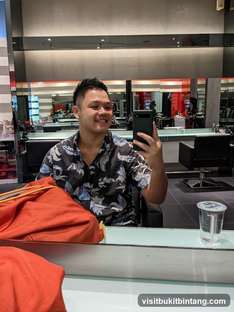Man taking a selfie in a salon
