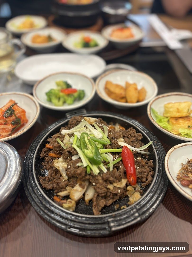 Korean Table Setting with Bulgogi and Side Dishes