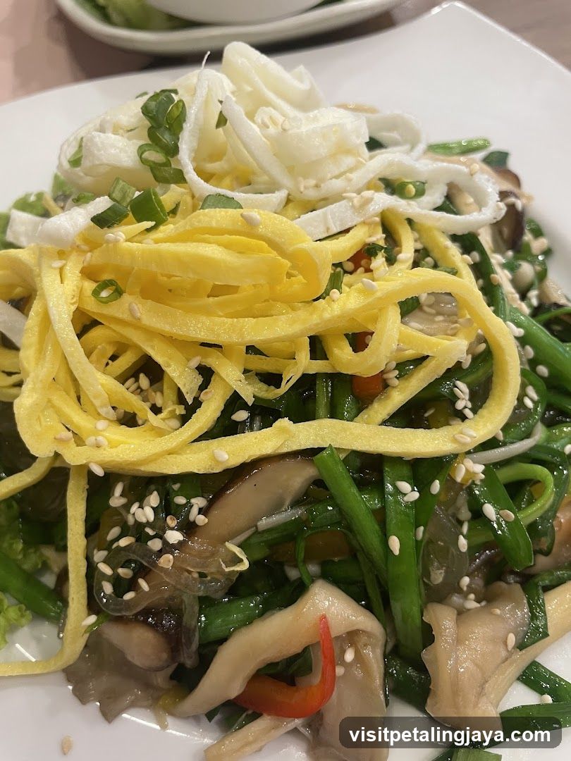 Stir-fried vegetables with egg and mushrooms