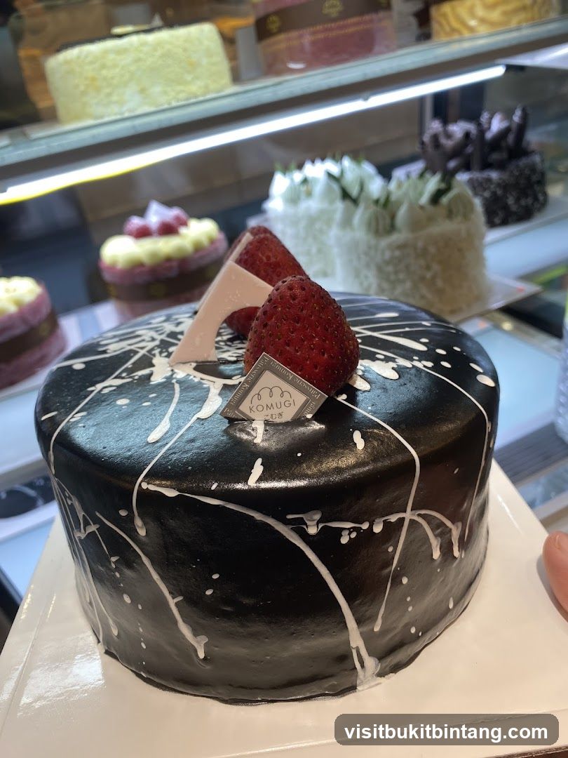 Black Frosted Cake with Strawberries