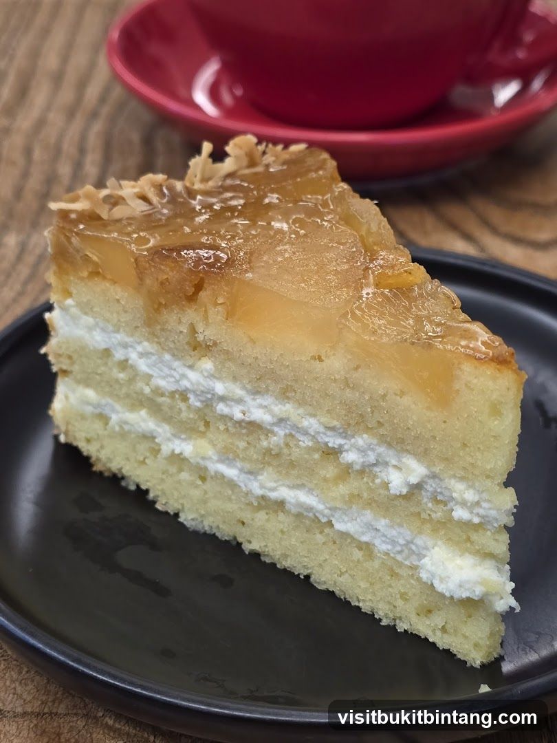 Slice of Cake with Cream and Fruit Topping