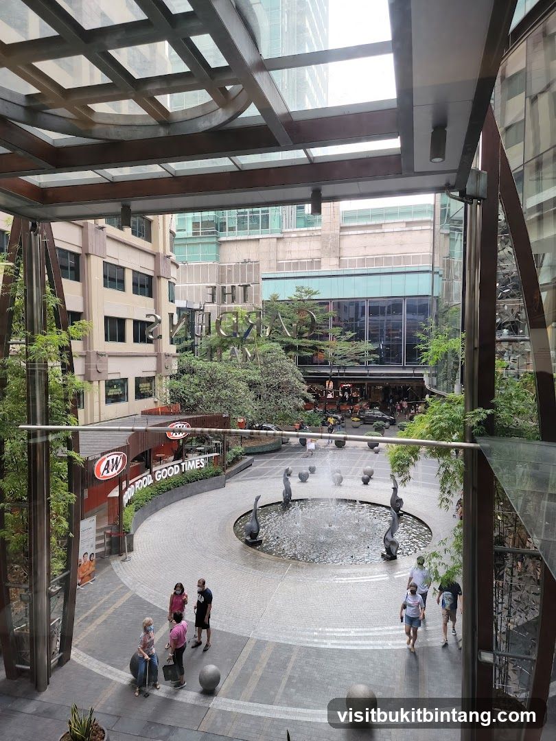 Outdoor Plaza with Fountain and Shops